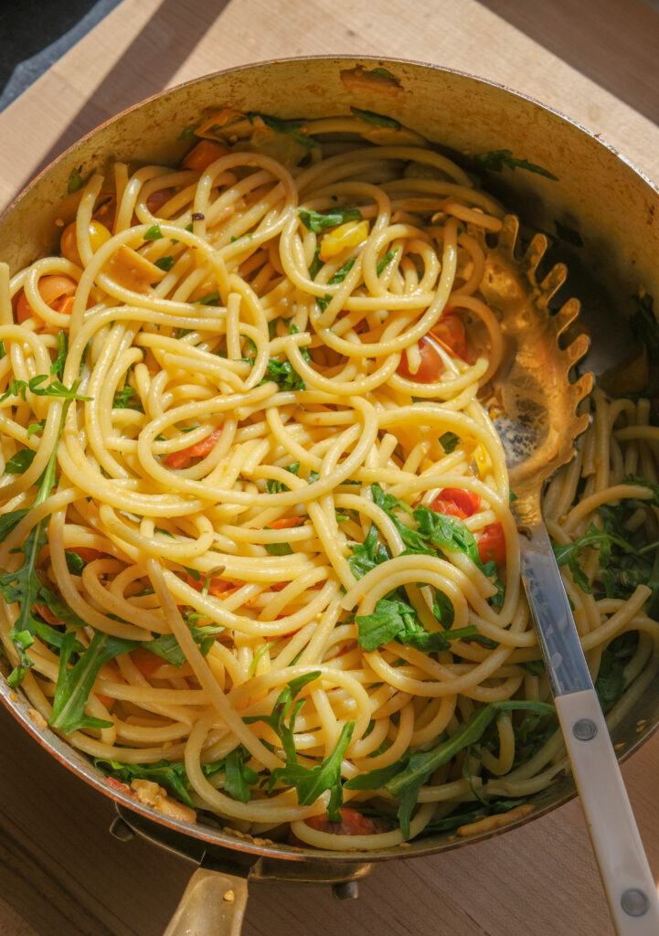 Bucatini with Burst Cherry Tomatoes, Fennel Seed, and Arugula